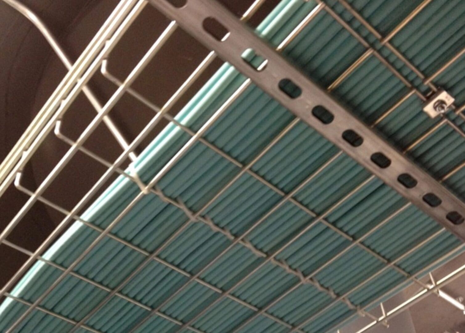 A ceiling with blue and white strips on it